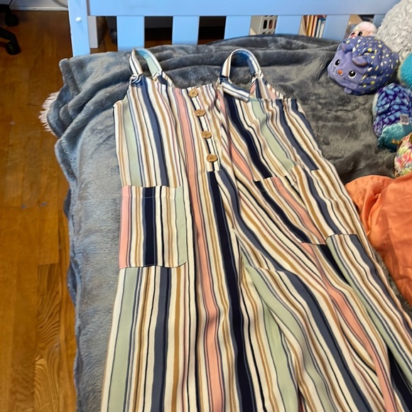 This is a one piece and the legs part is long and you have a lot of room - Picture 1 of 5